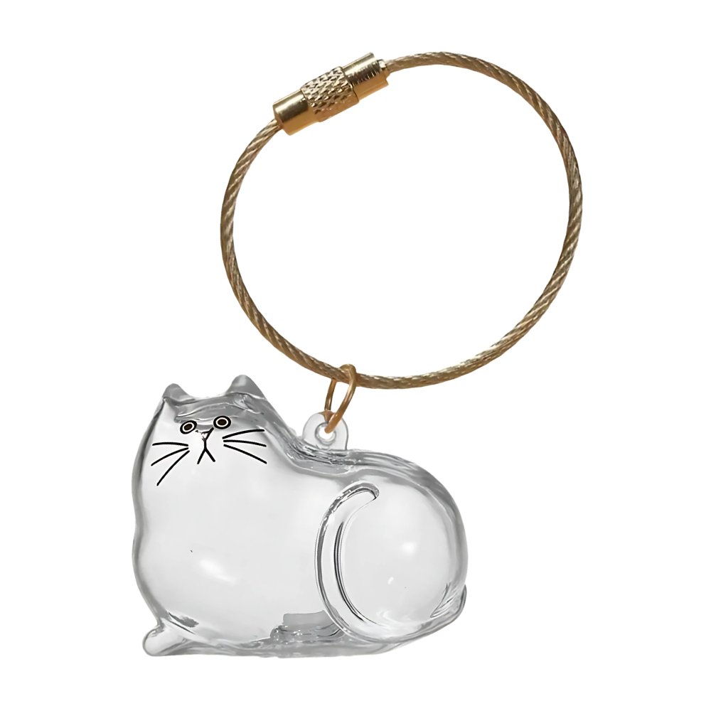 Porte-clés capsule poils de chat