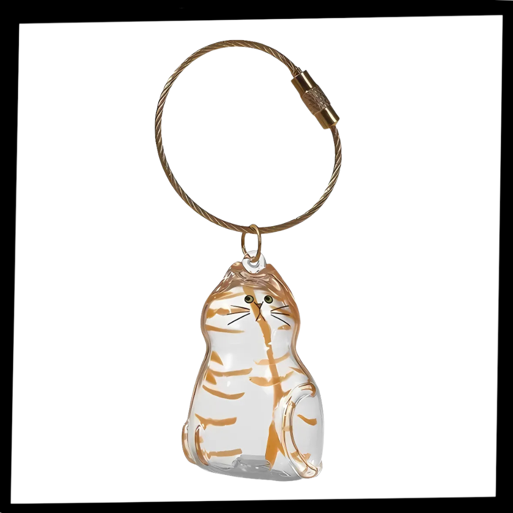 Porte-clés capsule poils de chat