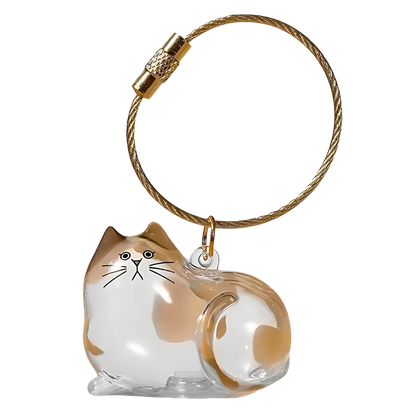 Porte-clés capsule poils de chat