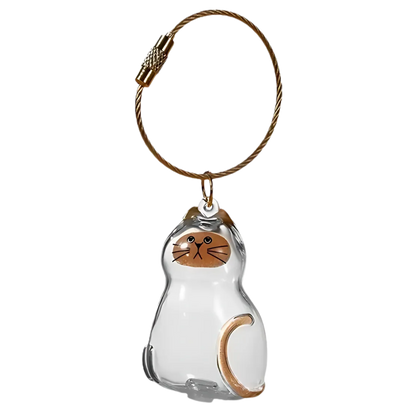Porte-clés capsule poils de chat